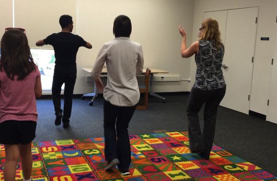 Renowned dance instructor Ludis Benitez teaches the rudiments of Cuban Salsa to kids and teens at the Montana Ave. Branch as part of the summer program.