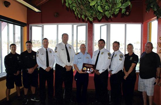 The United States Coast Guard presented the Santa Monica Police Department (SMPD) Harbor Unit with an award recognizing their service and vigilance on Wednesday. On the plaque, the engraved “semper paratus” meaning “always ready” shone through the sunlit room as a sign of excellence. “On behalf of the Santa Monica police department, we are extremely proud of our harbor unit, and are appreciative of the United States Coast Guard for recognizing the quality of work that we’ve had for over fifty years with them,” said SMPD Lieutenant Saul Rodriguez.